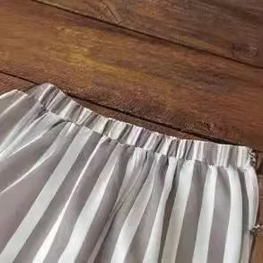 Ilenia | Pantalón ancho de rayas con abertura